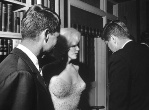 Marilyn Monroe with the Kennedy brothers.
